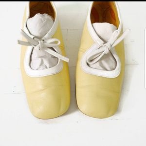 Vintage 1960s mod style yellow/white flats
